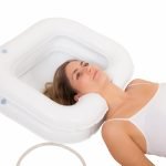 Lavacabezas hinchable para cama