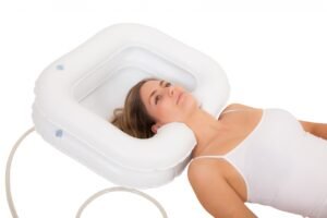 Lavacabezas hinchable para cama